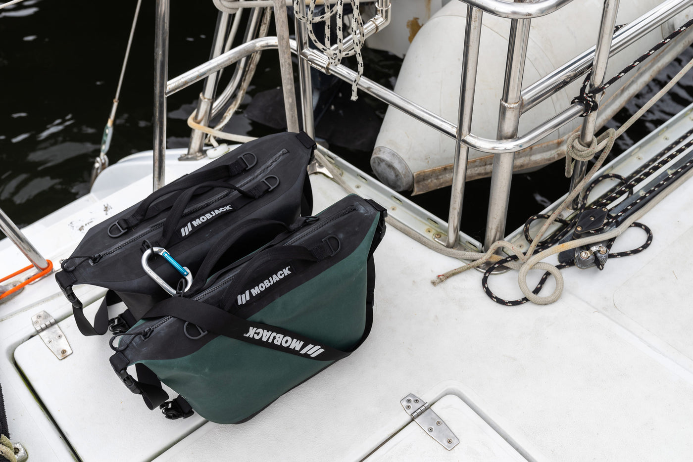 two mobjack captains bags sitting on boat